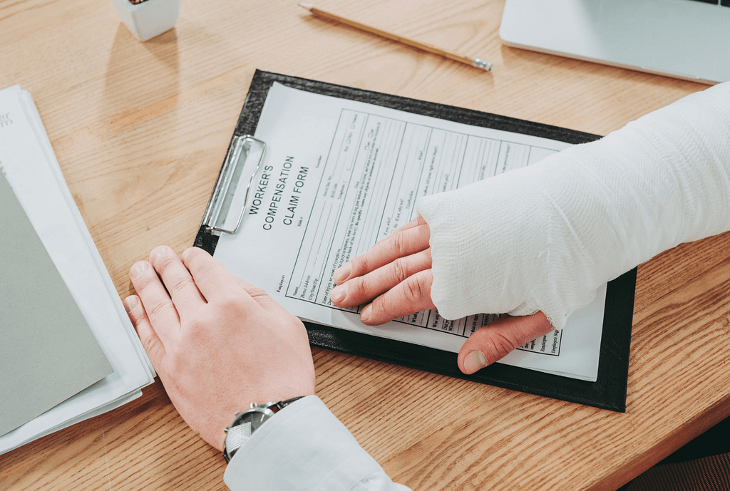 workers compensation forms, filling out form, cast on arm